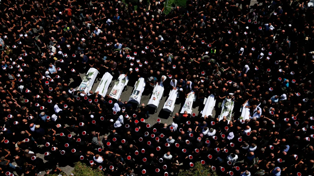 Thousands mourn children killed in Golan Heights strike