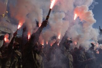 Thousands in Ukraine honor soldiers killed in blast and urge government to get prisoners freed