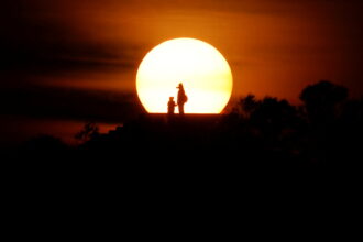 People enjoy the sunset in Vlora | Reuters News Agency