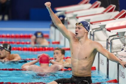 Longtime Phelps coach Bob Bowman was in tears watching new star pupil Leon Marchand win gold