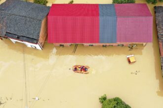 China reports 7 more deaths from torrential rains brought by tropical storm, raising toll to 22