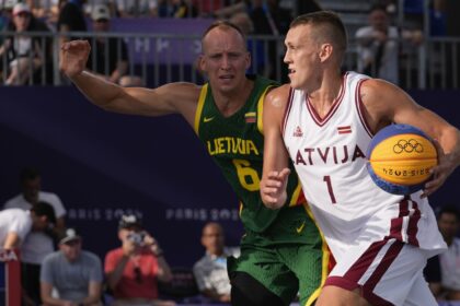 Miezis leads defending champion Latvia to 21-14 win over Lithuania in 3×3 basketball at Paris Games