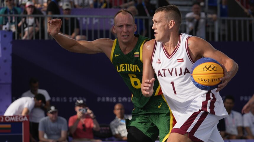 Miezis leads defending champion Latvia to 21-14 win over Lithuania in 3×3 basketball at Paris Games