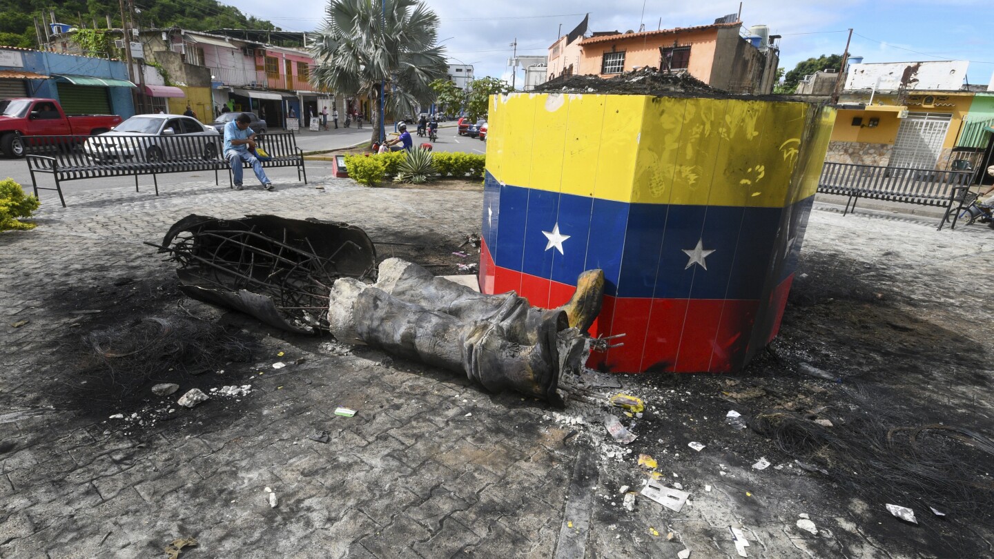 Hugo Chávez statues targeted across Venezuela in post-election unrest