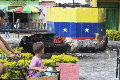 Protesters topple statues of Hugo Chavez in Venezuela as anger at election result grows