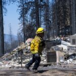 Firefighters make progress against massive blaze in California ahead of warming weather