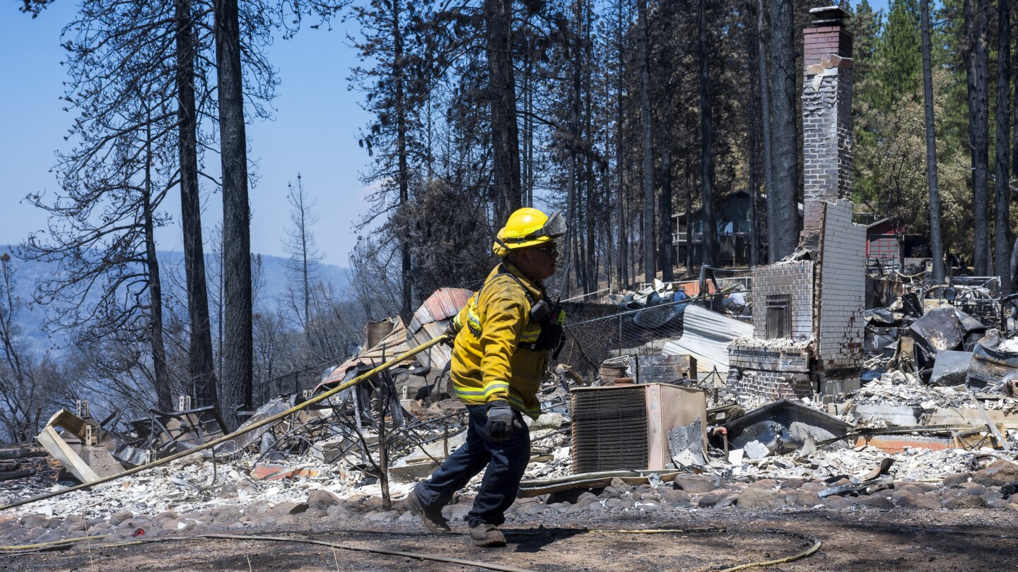 Firefighters make progress against massive blaze in California ahead of warming weather