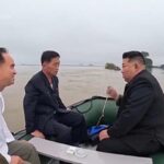 North Korea leader and senior officials board small boat to inspect impact of devastating floods