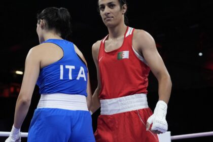 Imene Khelif, Algeria boxer who had gender test issue, wins first Olympic fight when opponent quits