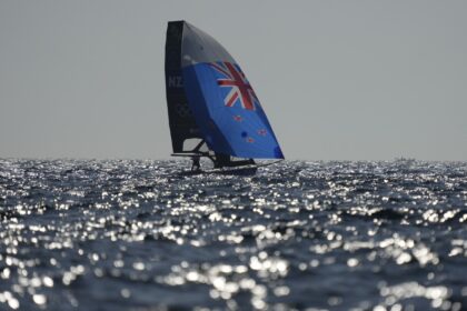 A lack of wind forces scuttles first Olympic sailing medal races, leaving sailors broiling