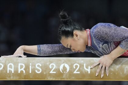 Sunisa Lee’s long road back to the Olympics ended in a familiar spot: the medal stand