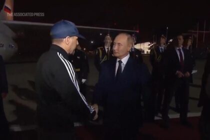 Putin greets prisoners freed in swap with US as they arrive in Moscow