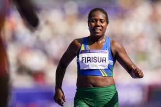 Solomon Islands distance runner Sharon Firisua steps into sprints, finishes last in 100 at Olympics