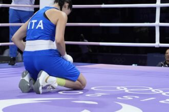 Who is Italian boxer Angela Carini and why did she quit her fight against Imane Khelif?