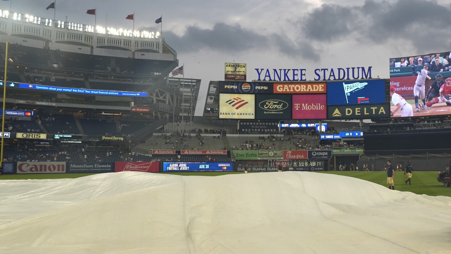 Some Yankee Stadium bleachers fans chant `U-S-A!’ during `O Canada’ before game against Blue Jays