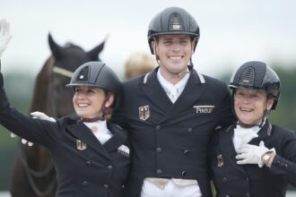 Germany edges Denmark to win a third straight Olympic team dressage title