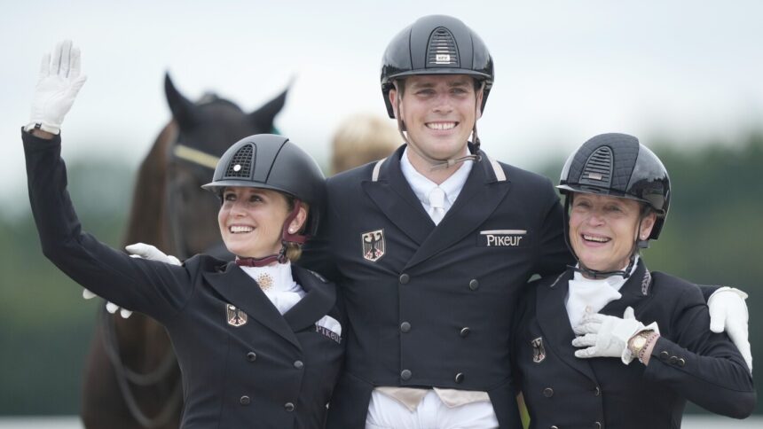 Germany edges Denmark to win a third straight Olympic team dressage title