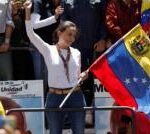 Venezuelan opposition leader addresses rally amid arrest threat