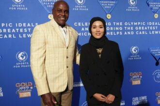 Iconic Olympians Carl Lewis and Michael Phelps honored at gala for their philanthropy contributions