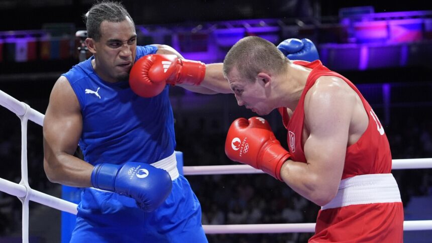 Two-time Olympic gold medalist boxer Arlen López of Cuba loses in Paris semis to Oleksandr Khyzhniak