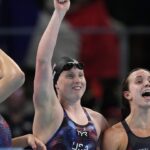 On a wild final night of swimming, U.S. sets two world records, edges Australia in gold-medal race