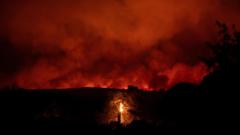 Watch: ‘Anger and grief’ as Athens wildfires continue overnight