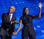 Barack and Michelle Obama electrify Democrats but warn of tight race