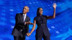 Barack and Michelle Obama electrify Democrats but warn of tight race