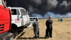 Russian priests bless fire engines as Rostov oil depot blaze rages