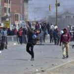 Street battles in Bolivia as Evo Morales leads march to capital