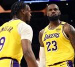 LeBron James: Los Angeles Lakers star makes NBA history by playing with son Bronny in season-opening win over Minnesota Timberwolves