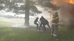 Bodycam captures moment woman rescued from burning house in Ohio