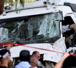 One dead, dozens injured after truck hits Israel bus stop