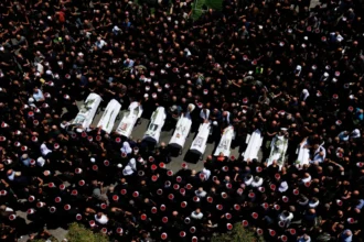 Thousands mourn children killed in Golan Heights strike