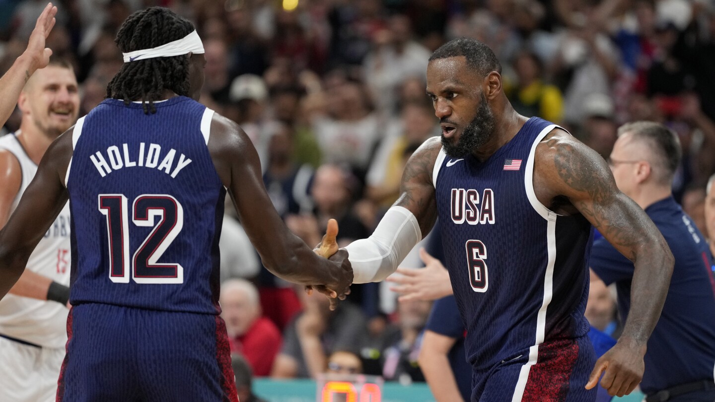 US men’s basketball team rolls past Serbia 110-84 in opening game at the Paris Olympics