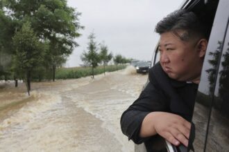 5,000 people rescued from flooding in North Korea in evacuation efforts led by Kim, report says