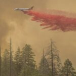 California firefighters make progress as wildfires push devastation and spread smoke across US West