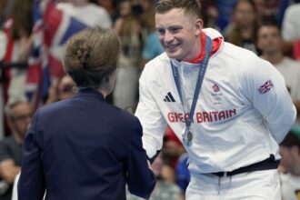 British swimming star Adam Peaty tests positive for COVID after winning silver medal