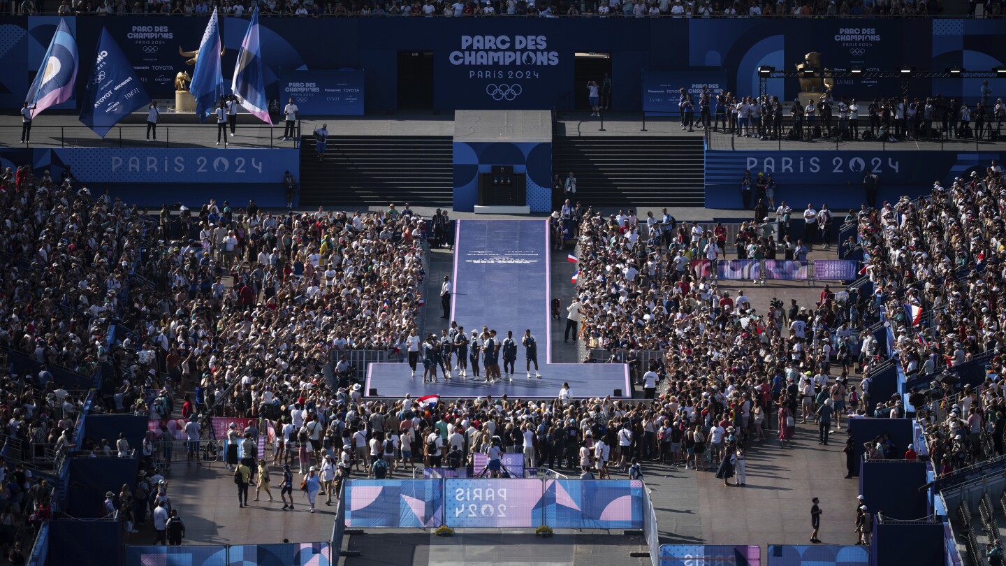 Olympics medalists celebrate in front of fans at new Champions Park in Paris