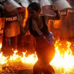 Venezuelans clash with police after disputed election result