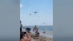 Hundreds of thousands of dragonflies swarm beachgoers