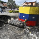 Hugo Chávez statues targeted across Venezuela in post-election unrest