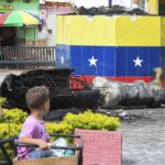 Protesters topple statues of Hugo Chavez in Venezuela as anger at election result grows