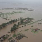 Recent rains in North Korea flooded thousands of houses and vast farmland, state media says