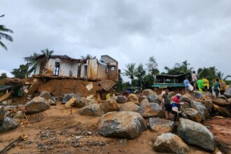 Rescuers search through mud and debris as deaths rise to 151 in landslides in southern India