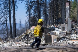 Firefighters make progress against massive blaze in California ahead of warming weather