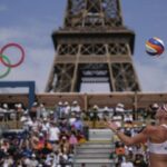 At the Olympic beach volleyball venue, the Eiffel Tower stars in a très French show