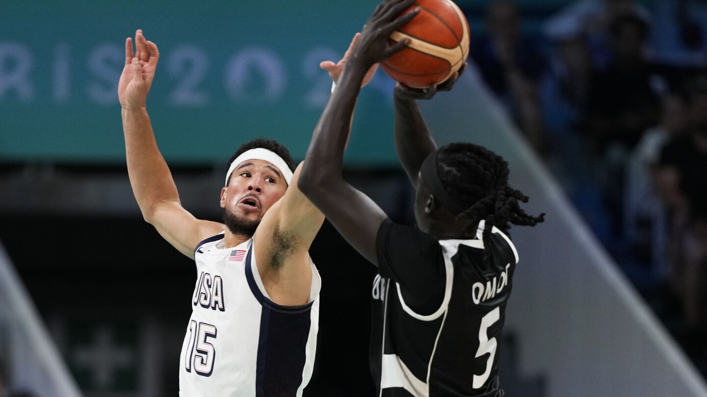 Defeated, but not broken, South Sudan basketball has chance to continue its Paris Olympics odyssey