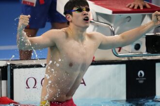 Pan Zhanle of China breaks own world record to win Olympic gold medal in men’s 100-meter freestyle