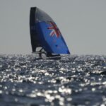 A lack of wind forces scuttles first Olympic sailing medal races, leaving sailors broiling